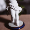 Porcelanowa figurka biskwitowa dziecko grające lata 60te